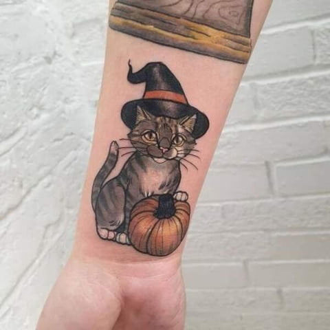 Charlotte Ann Harris Halloween cat tattoo