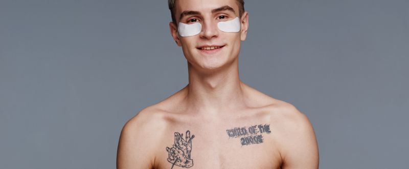 Tattooed Young Man with Face Patches
