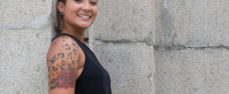 a woman with shoulder tattoo