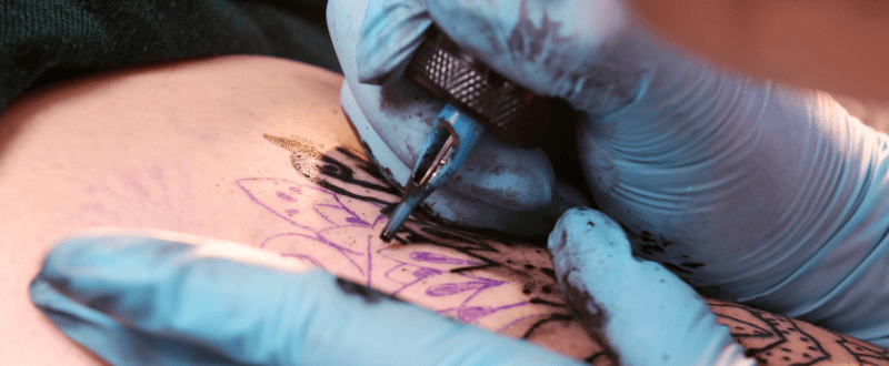 Close up of a person getting a tattoo