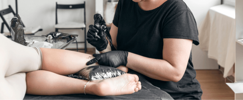 Fine-line tattoo artist