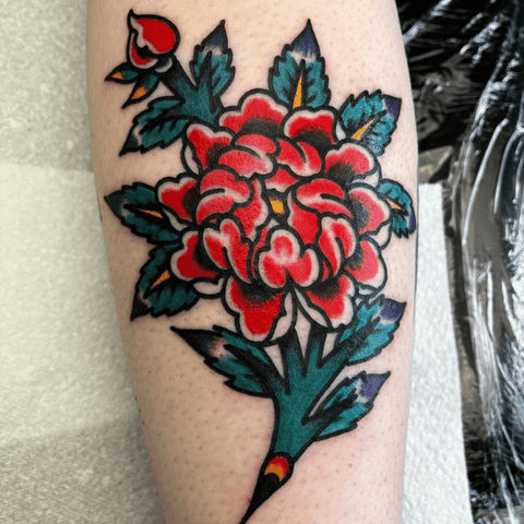 Red floral tattoo 