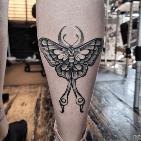 Luna moth calf tattoo