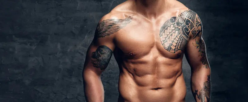 muscled man with tattoos