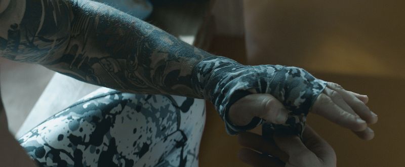 professional boxer with sleeve tattoo