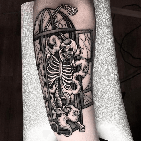 Skeleton tattoo with black tattoo ink