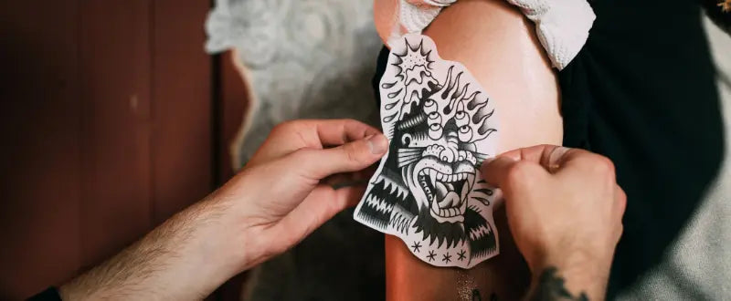 tattoo sketch trasferring into the skin