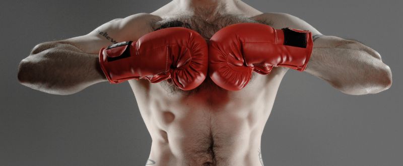 topless male boxer with tattoo