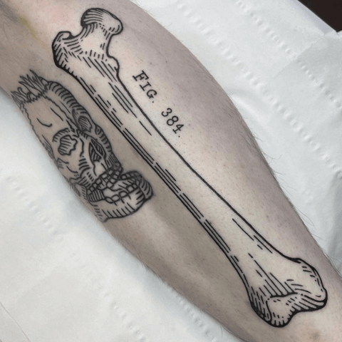Woodcut femur tattoo