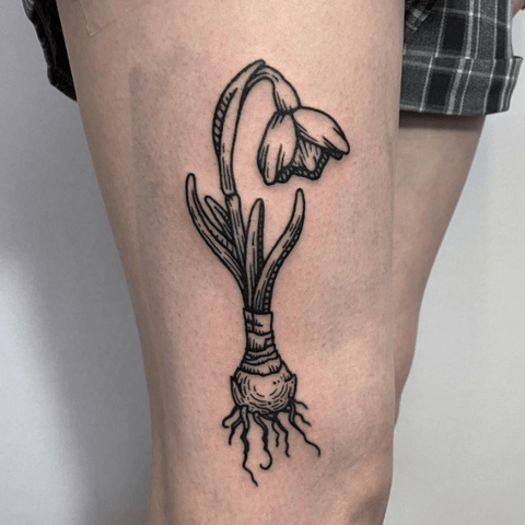 Woodcut flower tattoo