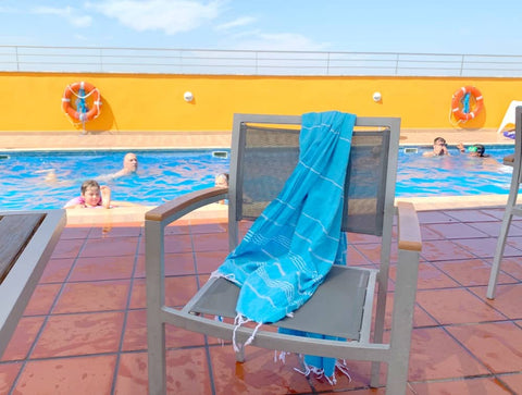 Hammam towel beside the pool