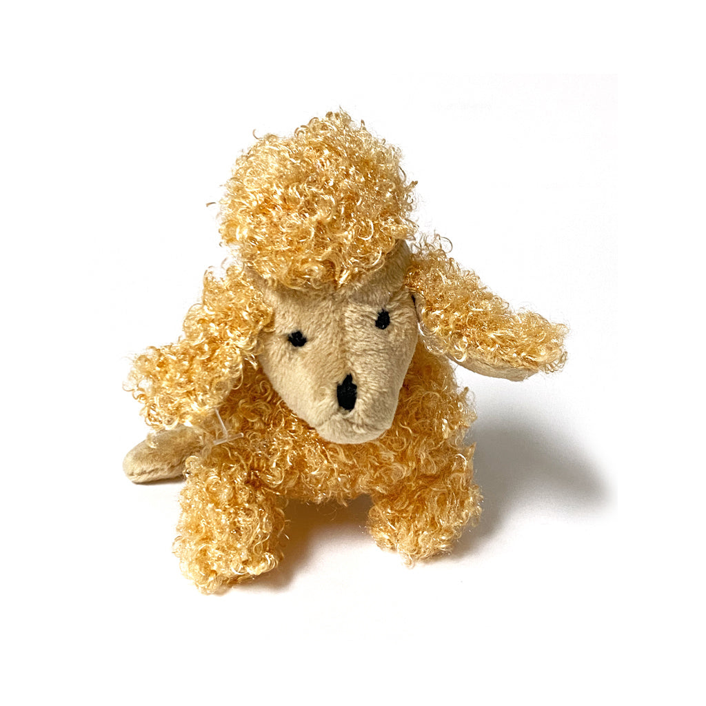 https://cdn.shopify.com/s/files/1/0911/7584/products/CocoTherapy-Tan-Poodle-Pipqueak-Toy_1024x.jpg?v=1666730790