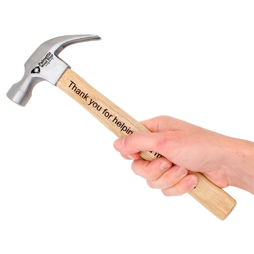 person holding a laser engraved hammer