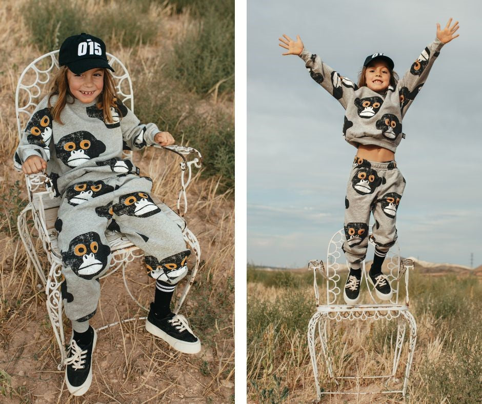 Young child in Little Man Happy Monkey Sweater and Monkey Sweatpants at Design Life Kids