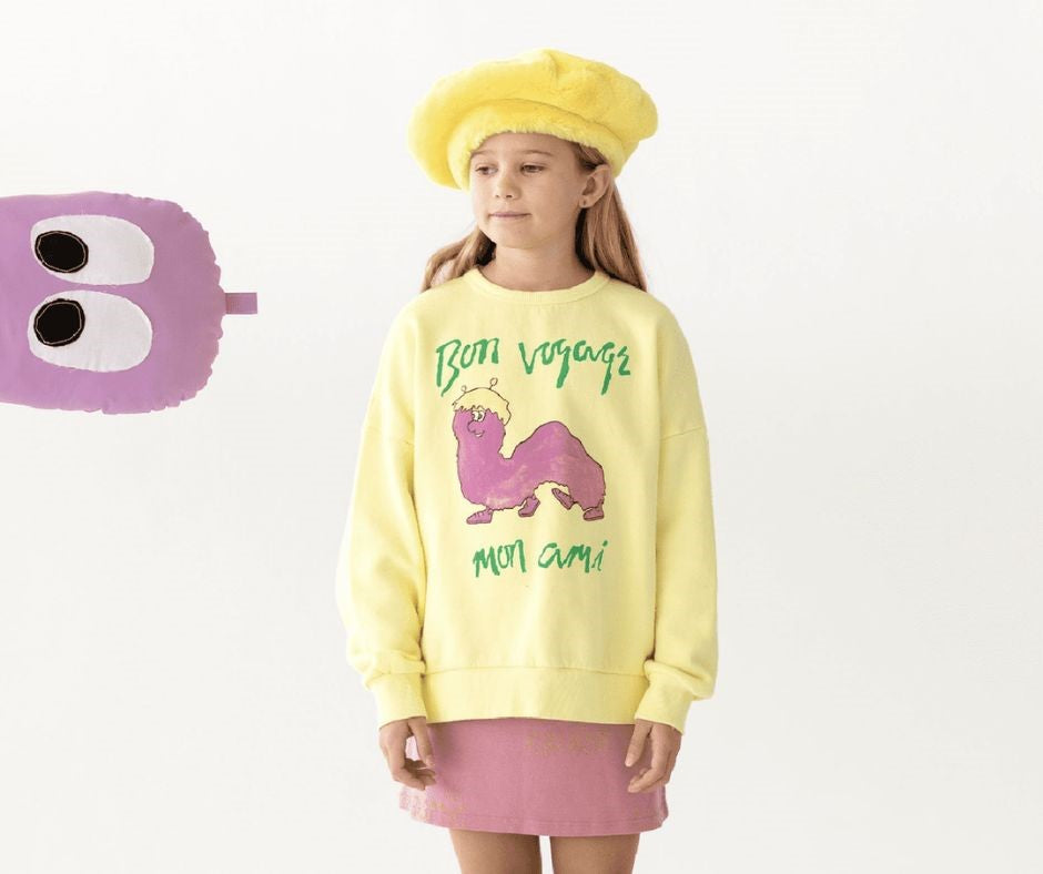 Young girl in Fresh Dinosaurs Gusano Sweatshirt at Design Life Kids