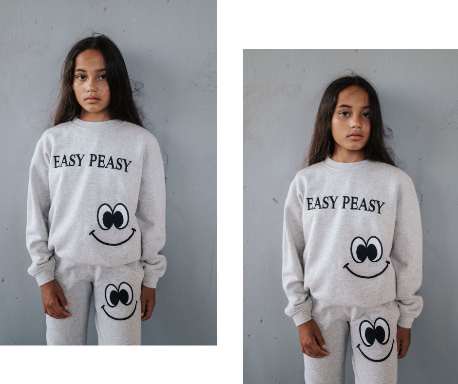 Young girl in Little Man Happy Easy Peasy Embroidered Sweatshirt at Design Life Kids