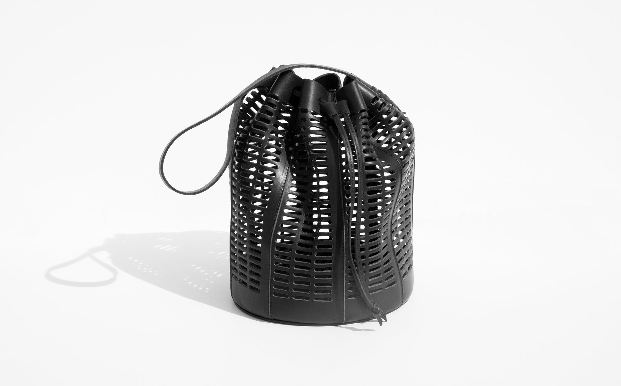 Modern Weaving Black Oval Die Cut Bucket Bag | Kindred Black