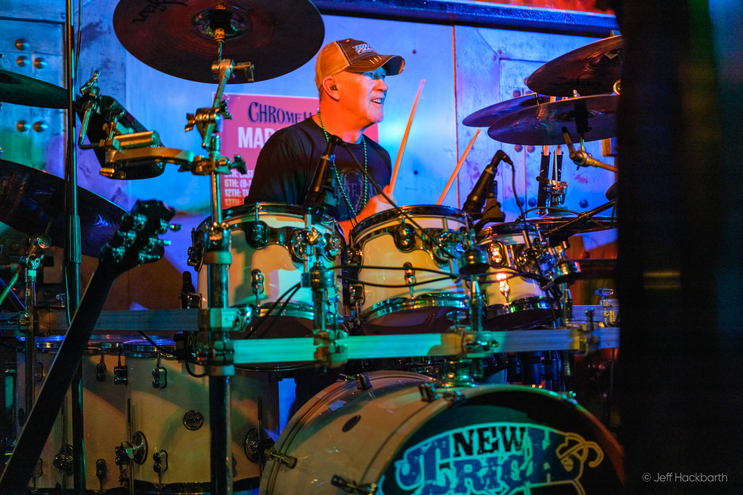 Drummer Frank Mason poses with Scorpion Percussion drumsticks behind his drumkit