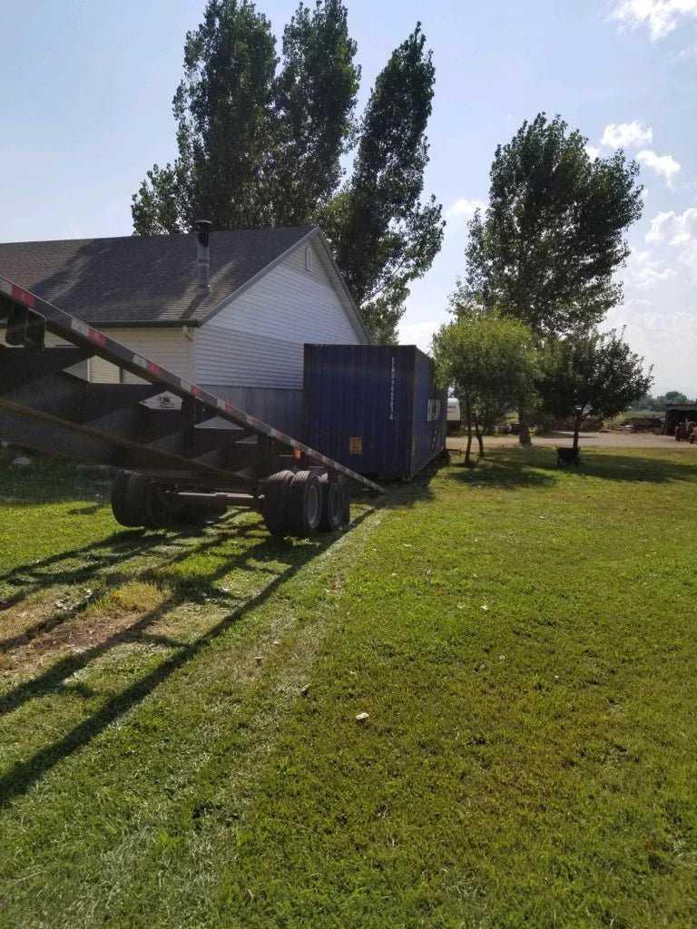 blue container next to house