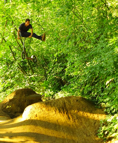 Cory Mosbrucker of RAD, no foot can-can over their hometown trails.