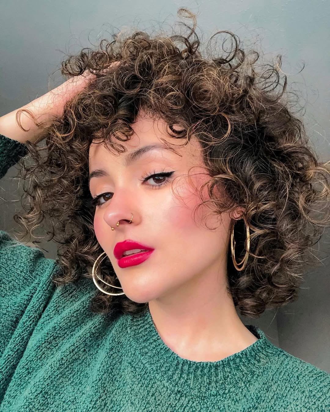 11. Messy Chocolate Curl Shag - Short Curly Hairstyles