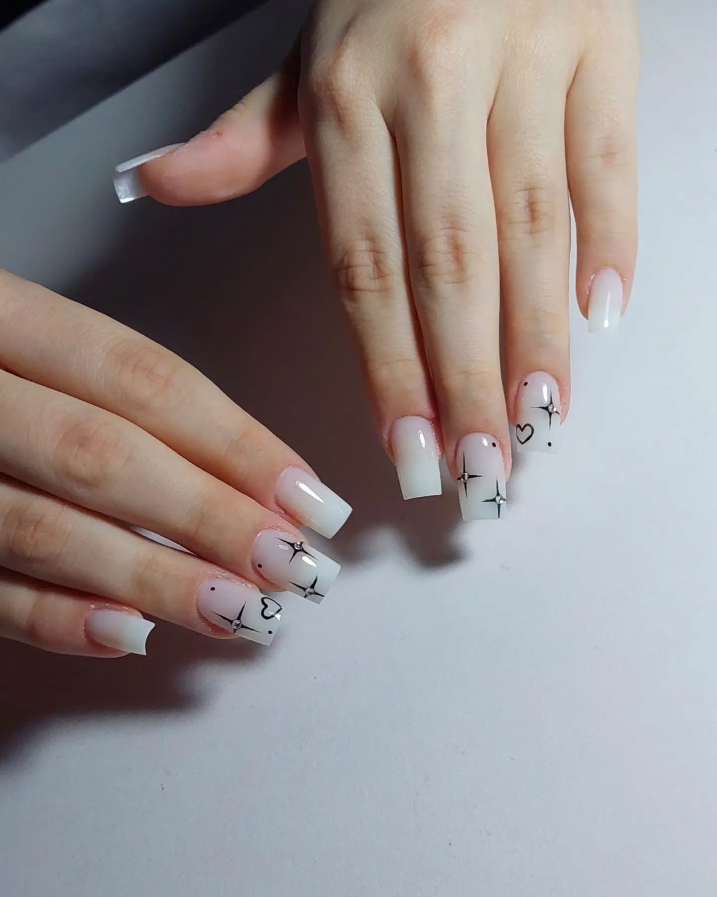11. Snowfall Sparkle Sketch - White Winter Nail Ideas