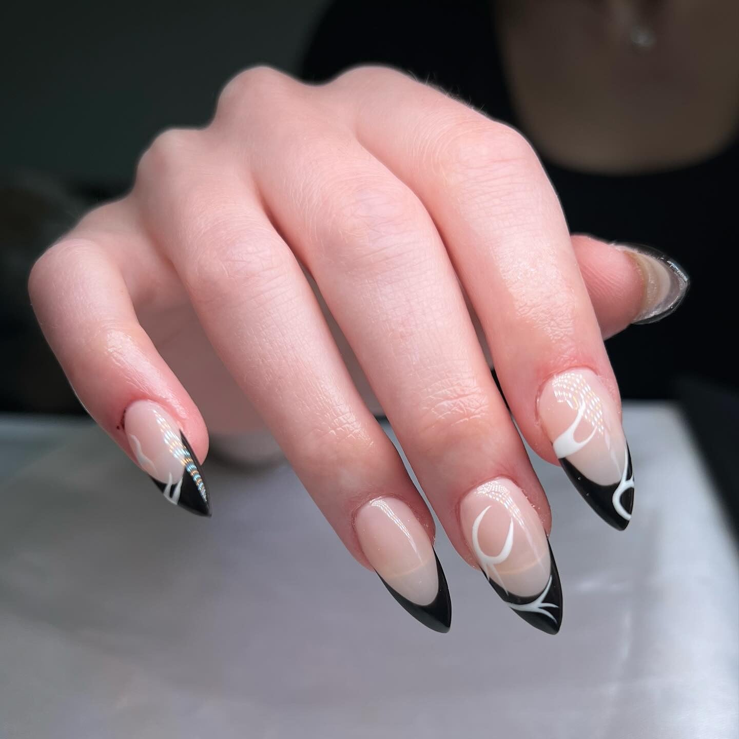 12. Glossy Noir Tips with White Script - Black and White Nail Ideas