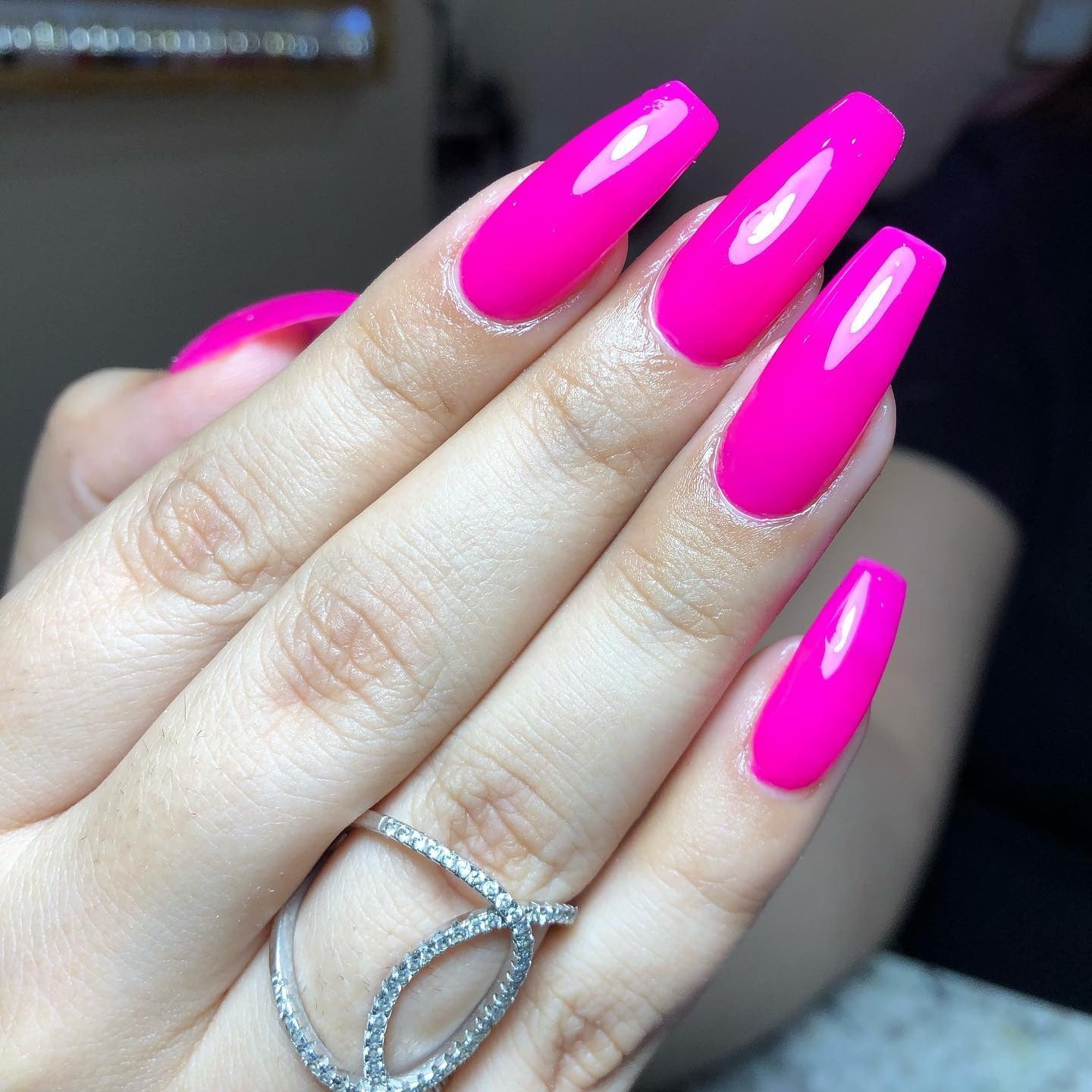 13. Electric Fuchsia Coffin Nails - Solid Nail Color Ideas
