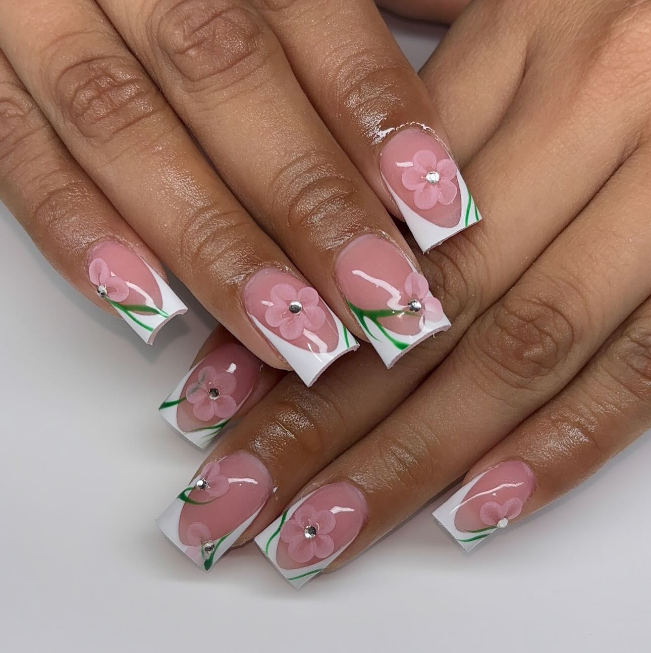 15. White Tip Florals with Rhinestone Detail - Short Spring Break Nail Ideas
