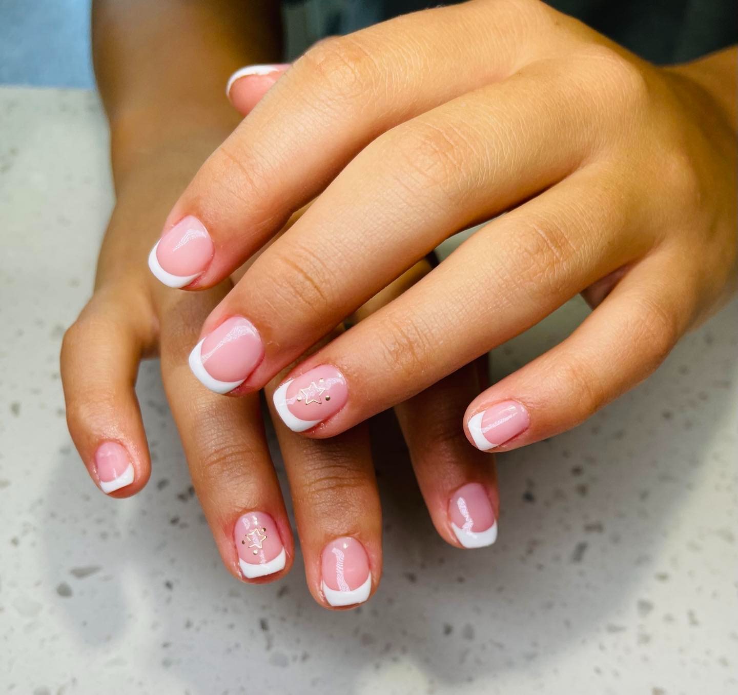 2. Classic French with a Starry Twist - Cute Nail Ideas for Short Nails