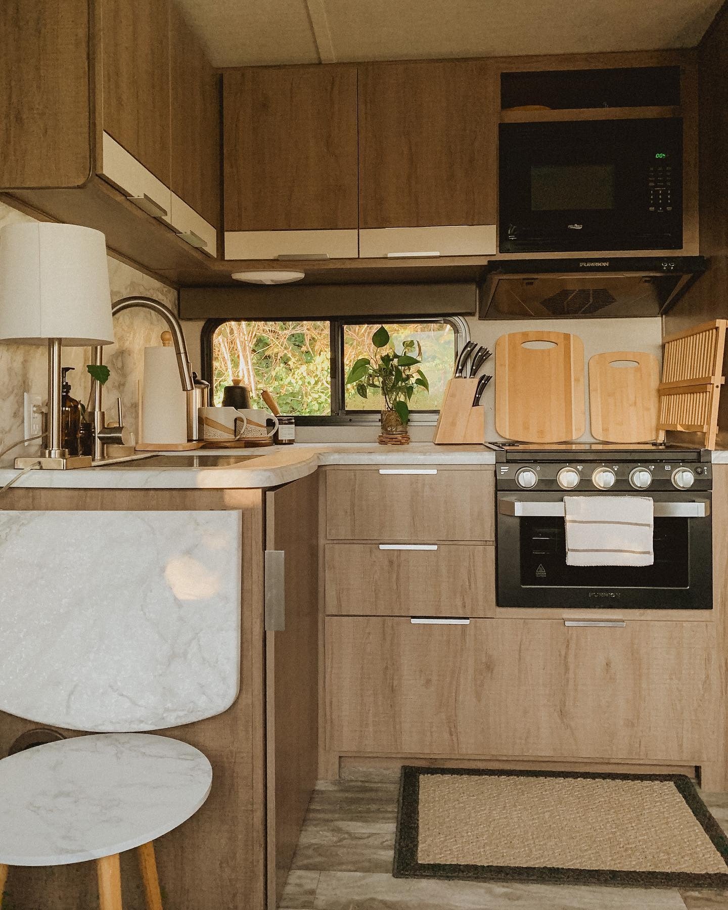 3. Compact Earthy Elegance in an RV Kitchen - Tiny Kitchen Ideas