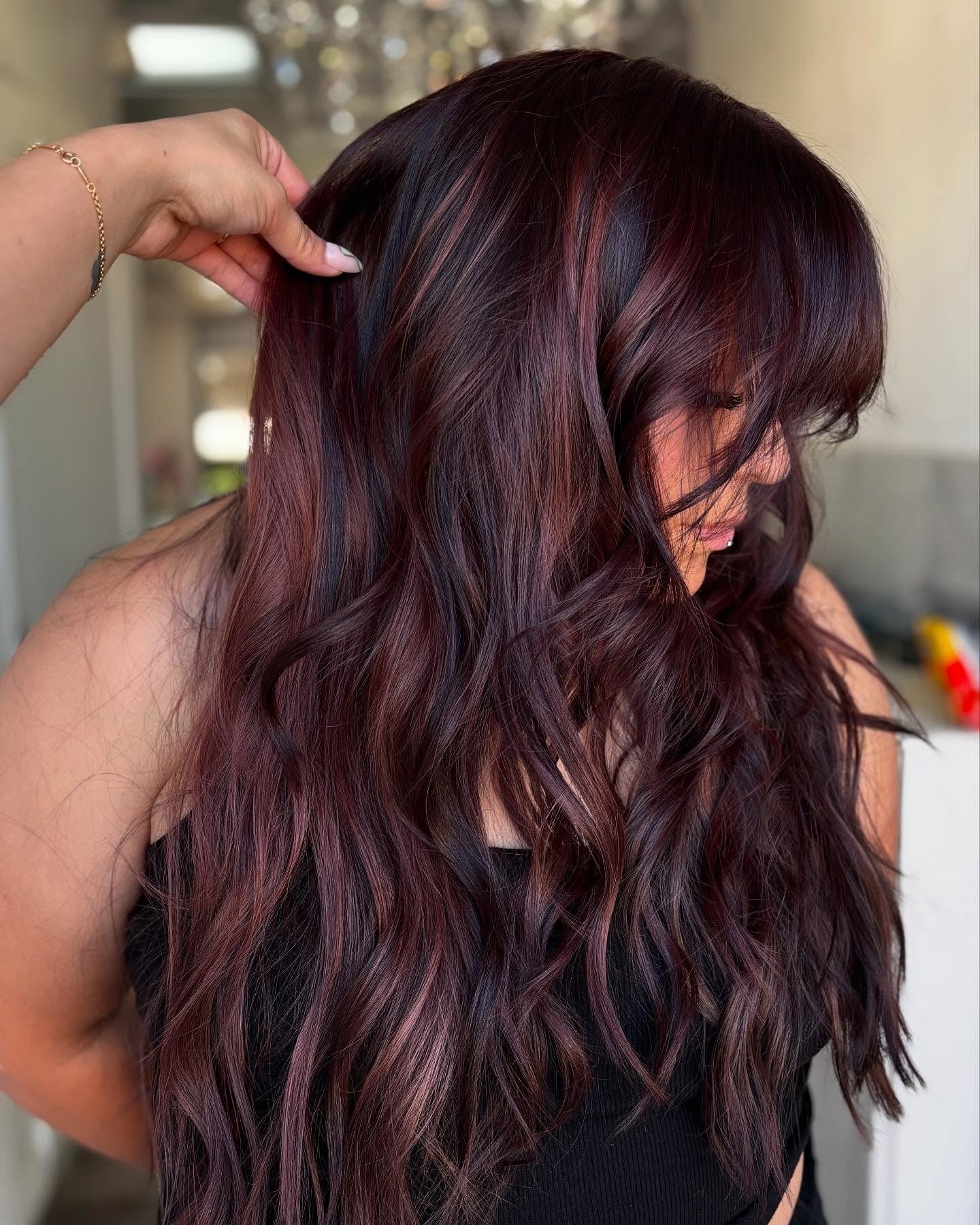 3. Multi-Toned Merlot with Curtain Bangs - Wine Hair Color
