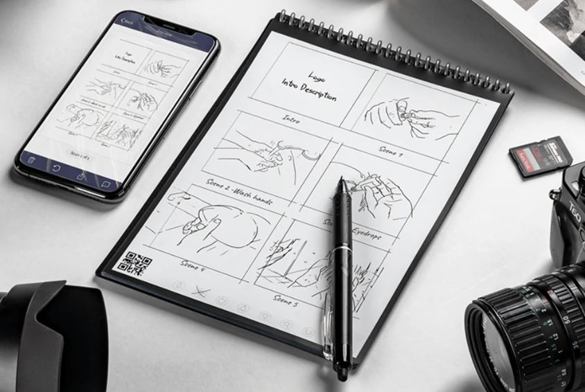 The Rocketbook Flip with sketches that have been shared to a smartphone