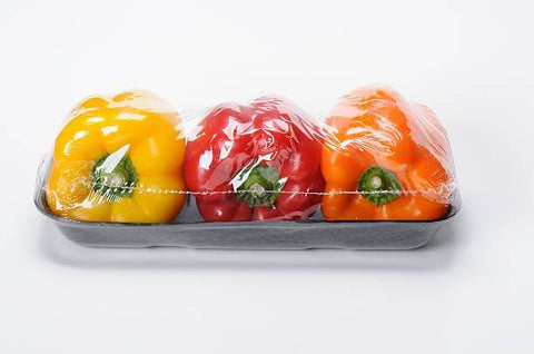 plastic wrapped unfresh peppers