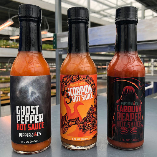 https://cdn.shopify.com/s/files/1/0915/1060/products/tour-heat-hot-sauce.jpg?v=1676922585&width=533