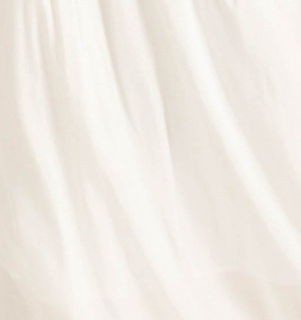 White maxi dress with cutout detail.