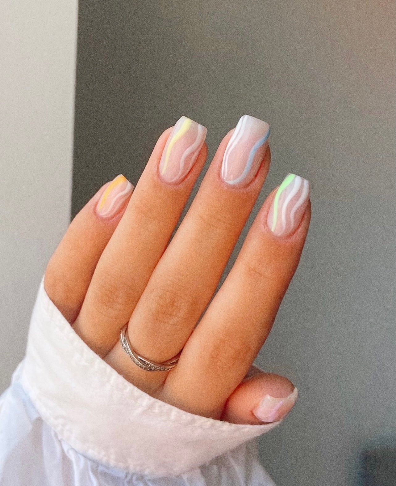 Manicure with pastel swirls 