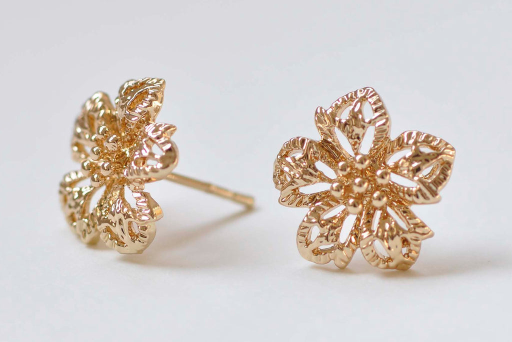 gold flower earrings studs