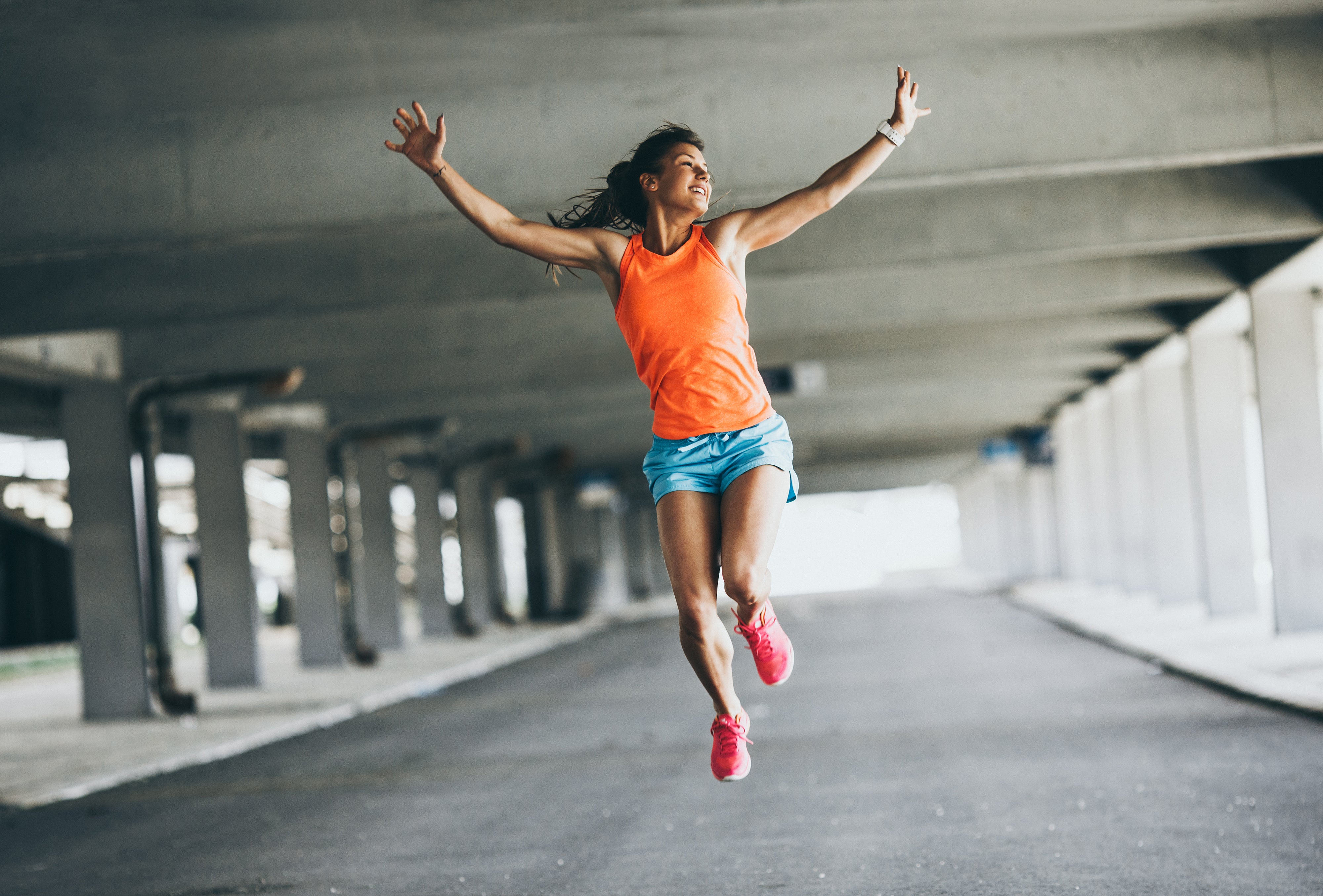 woman jumping with joy