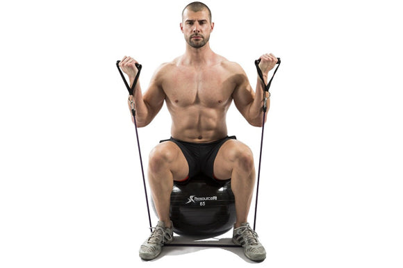 man sitting on prosourcefit stability ball doing bicep curls with prosourcefit tube resistance band with handles