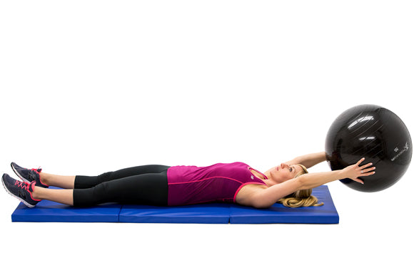 woman finishing ball pass core exercise with prosourcefit stability ball