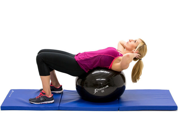 woman in starting position of crunch on prosourcefit stability ball