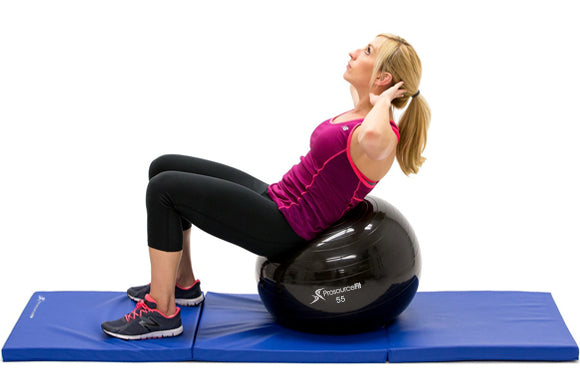 woman performing crunch on prosourcefit stability ball