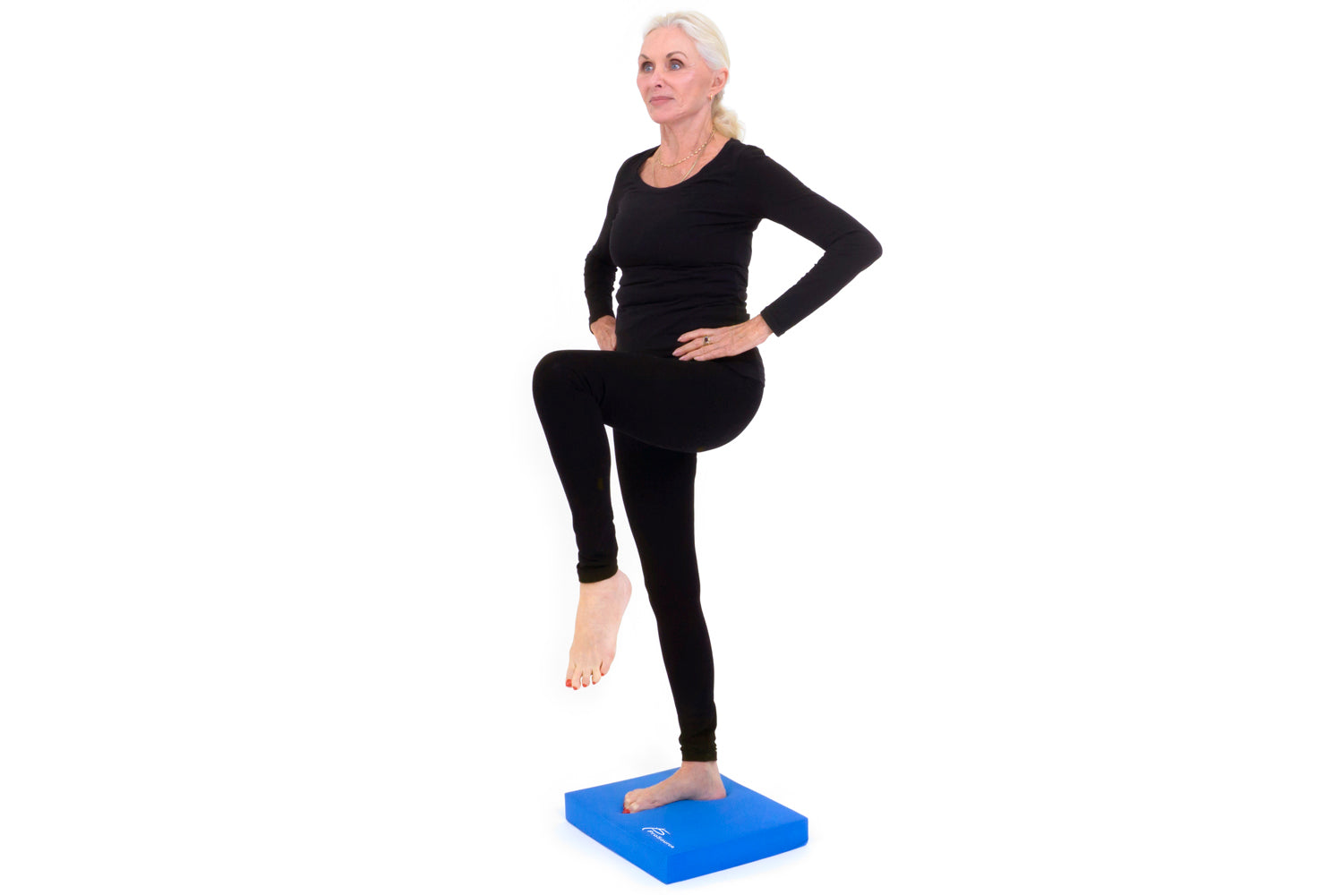 Single leg balance exercise on balance pad