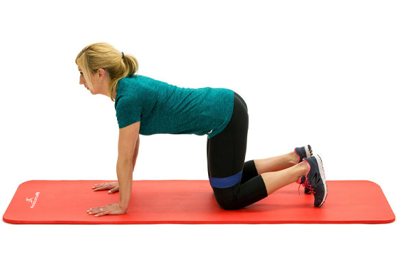 woman in tabletop position on prosourcefit extra thick yoga and pilates mat