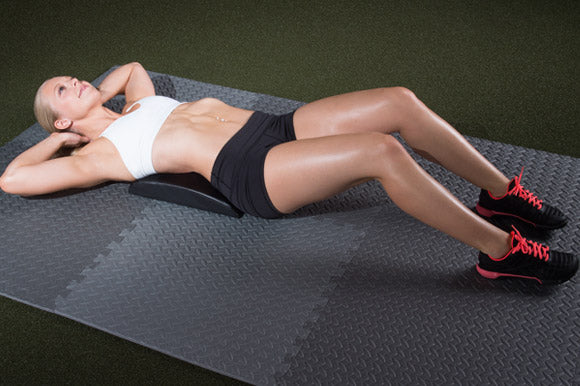 woman working out on prosourcefit ab mat