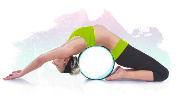 woman stretching back and chest on prosourcefit yoga wheel 