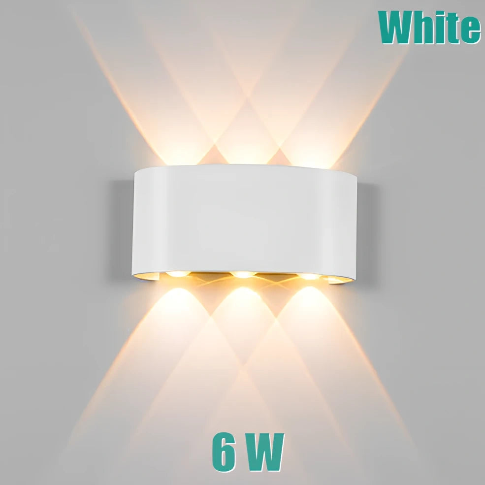 Waterproof black aluminium LED wall lamp 4W warm white emitting 60-degree beam angle mounted on white wall