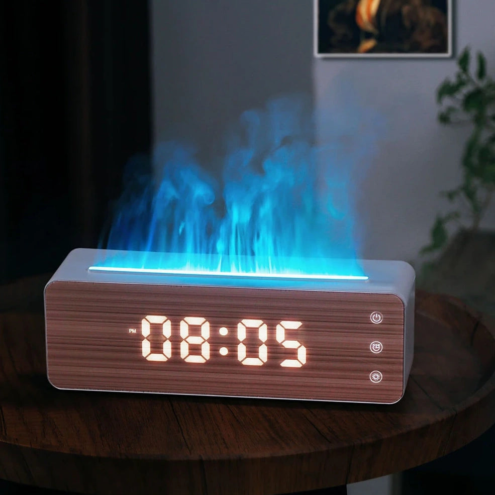 White flame-shaped humidifier with clock display measuring 28cm wide on desktop