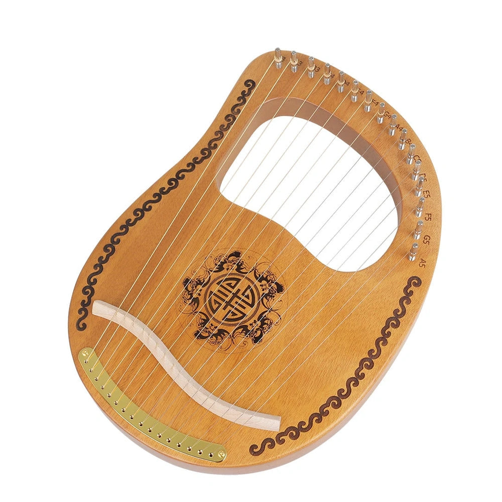 Small mahogany harp measuring 37cm wide with original wood colour and included tuning accessories